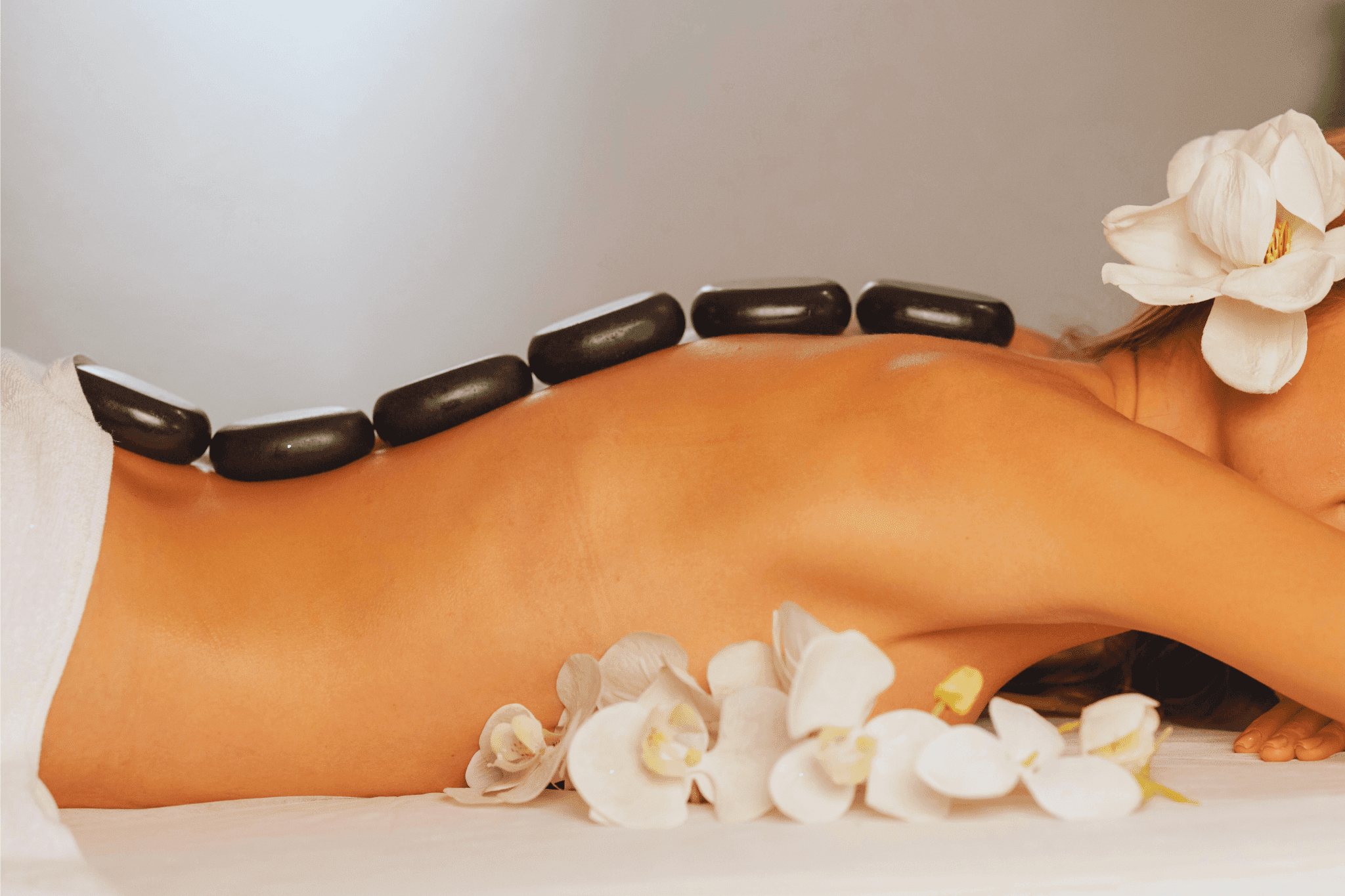 Top 10 Benefits Of Hot Stone Massage Aesthetician Web